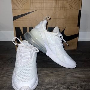 Nike air boys shoes size 7 with a blue heel. Also fits women size 8!